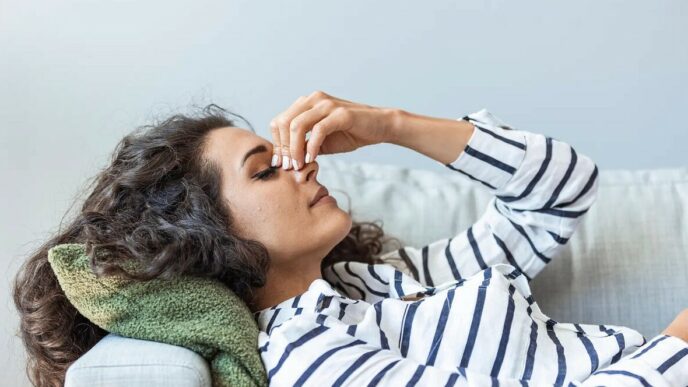 фото: втомлена жінка – низький гемоглобін у жінок