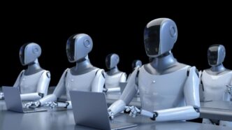 фото: роботи за ноутбуками – ризики штучного інтелекту