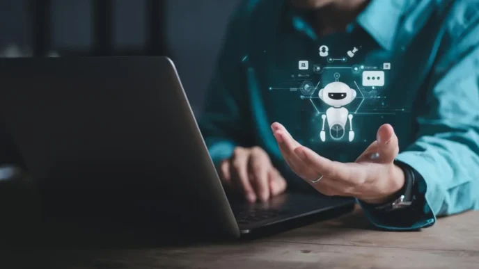 фото: людина працює за ноутбуком із технологіями штучного інтелекту