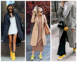 фото: жінка у чорних кросівках і стильному образі на вулиці - модні кросівки та черевики 2026